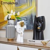 Opera Faces Sculpture