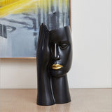 Opera Faces Sculpture