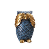 Astounded Owls Sculptures